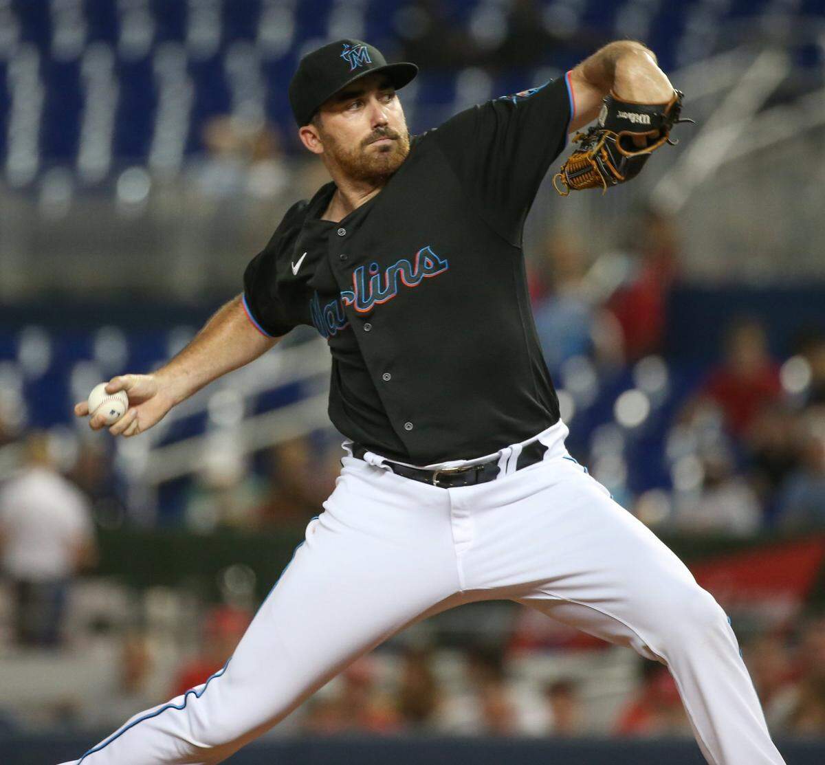 Miami Marlins relief pitcher Zach Thompson (74) pitches in the first inning as the Miami Marlins host the Cincinnati Reds at loanDepot park in Miami on Friday, August 27, 2021.
