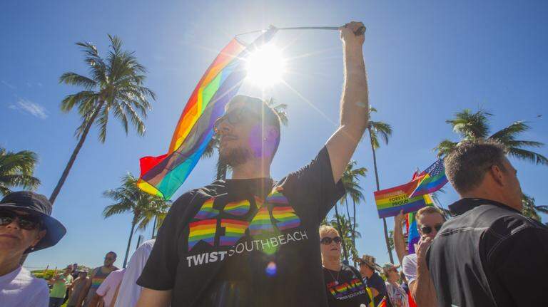 Protesters swarm South Beach after state-ordered rainbow sidewalk removal. See photos