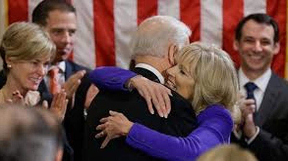 Jill and Joe Biden hug after he has taken the vice president’s oath of office in 2013.