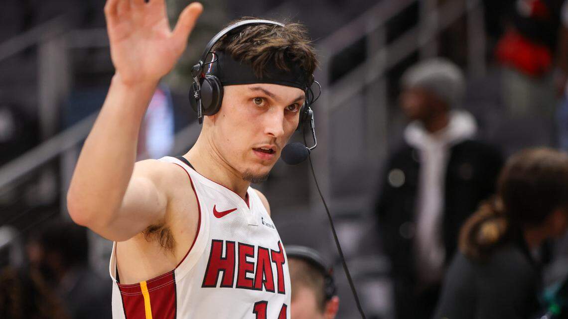 Miami Heat guard Tyler Herro (14) does an interview after a victory against the Atlanta Hawks at State Farm Arena.