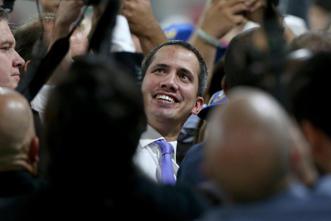 Venezuela’s interim President Juan Guaid takes a selfie with supporters at a rally to meet with the exiled Venezuelan community during his visit to Miami, on Saturday, February, 01, 2020.
