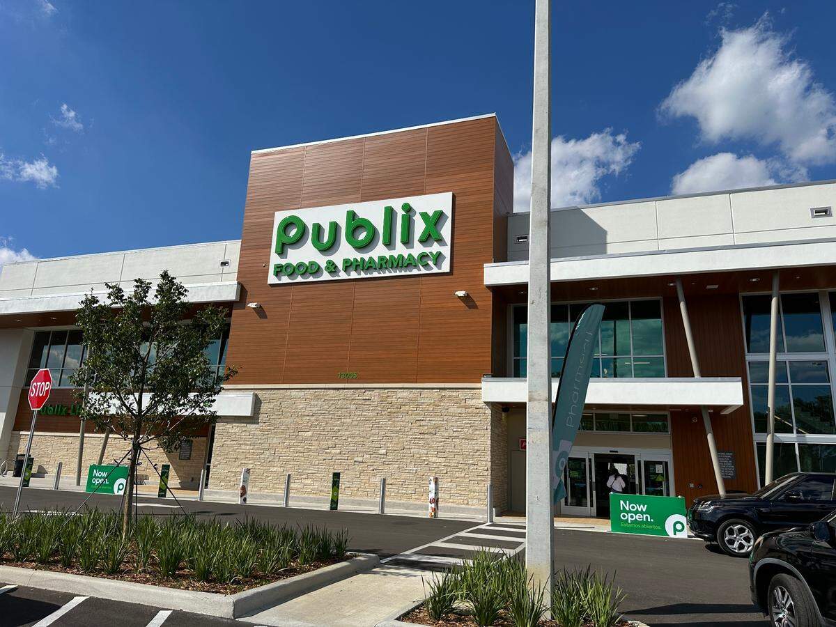 Now Open signs line the Briar Bay Publix at 13005 SW 89th Pl. on opening weekend, Sunday, March 2, 2025.