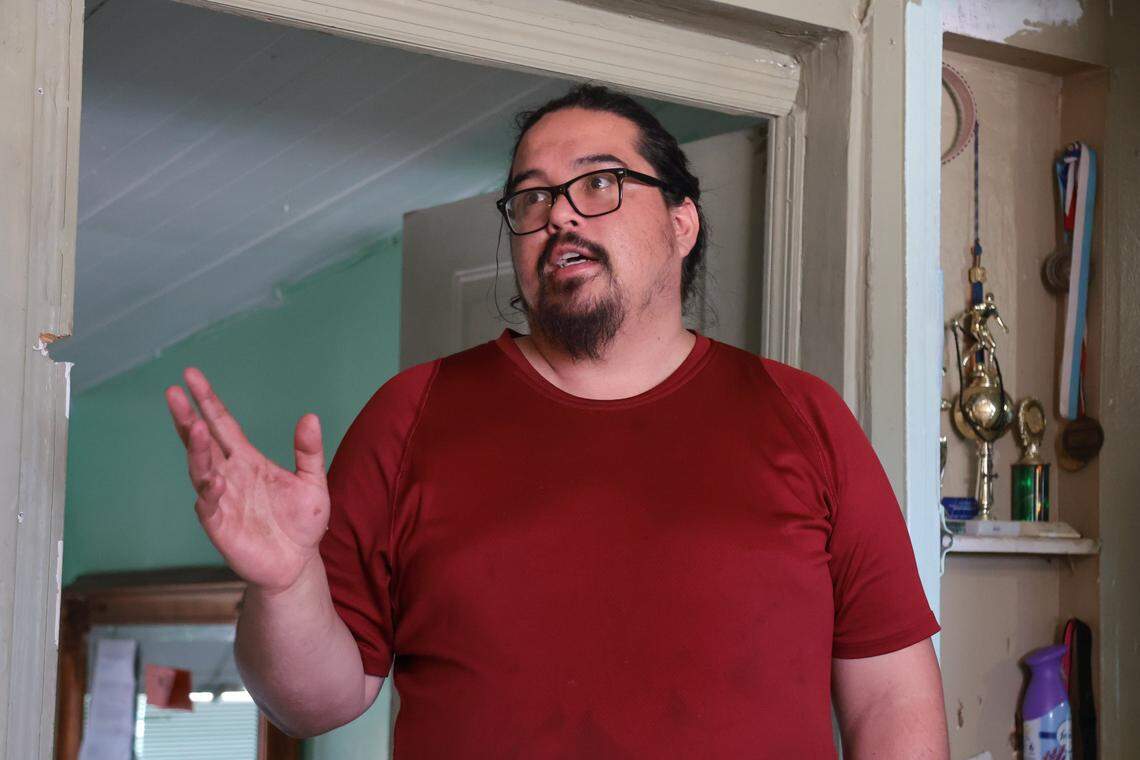Alex Lopez, 33, speaks from inside his mobile home at 11235 NW Flagler Lane about having to face eviction from the Li'l Abner Mobile Home Park in Sweetwater, Florida, Monday, October 20, 2025.