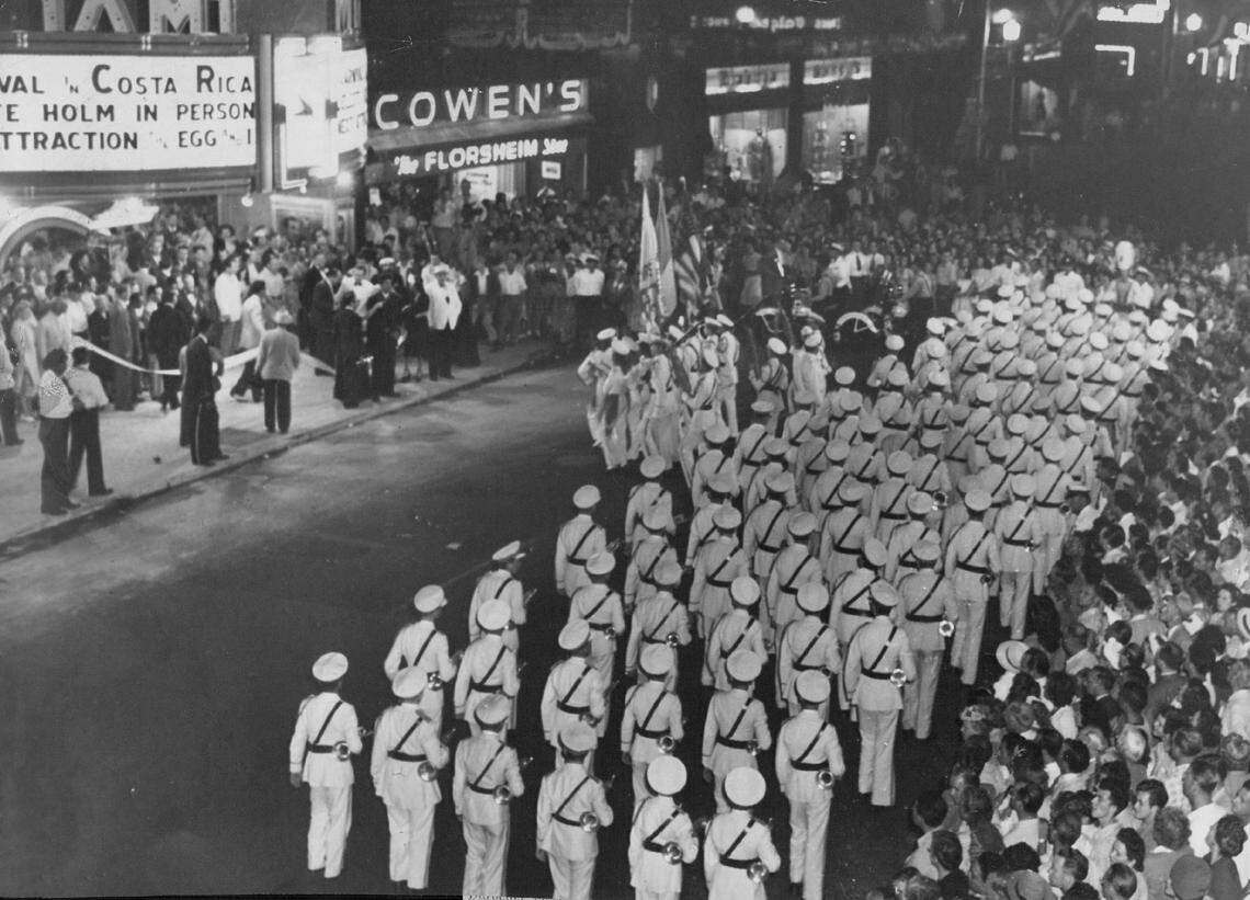 The opening of Wometco’s new Miami Theater in 1947 on Flagler Street as the Greater Miami Boys’ Drum and Bugle Corps wheels into place.