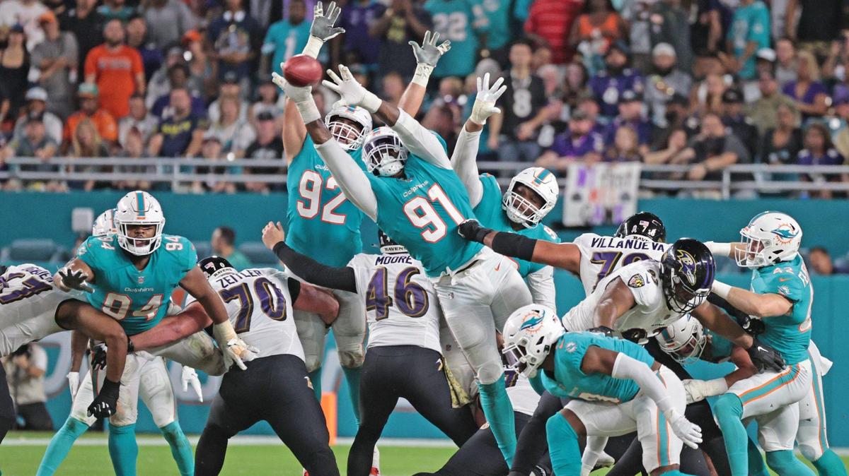The Miami Dolphins out pressure on the Baltimore Ravens who miss a field goal in the second quarter at Hard Rock Stadium on Thursday, November 11, 2021