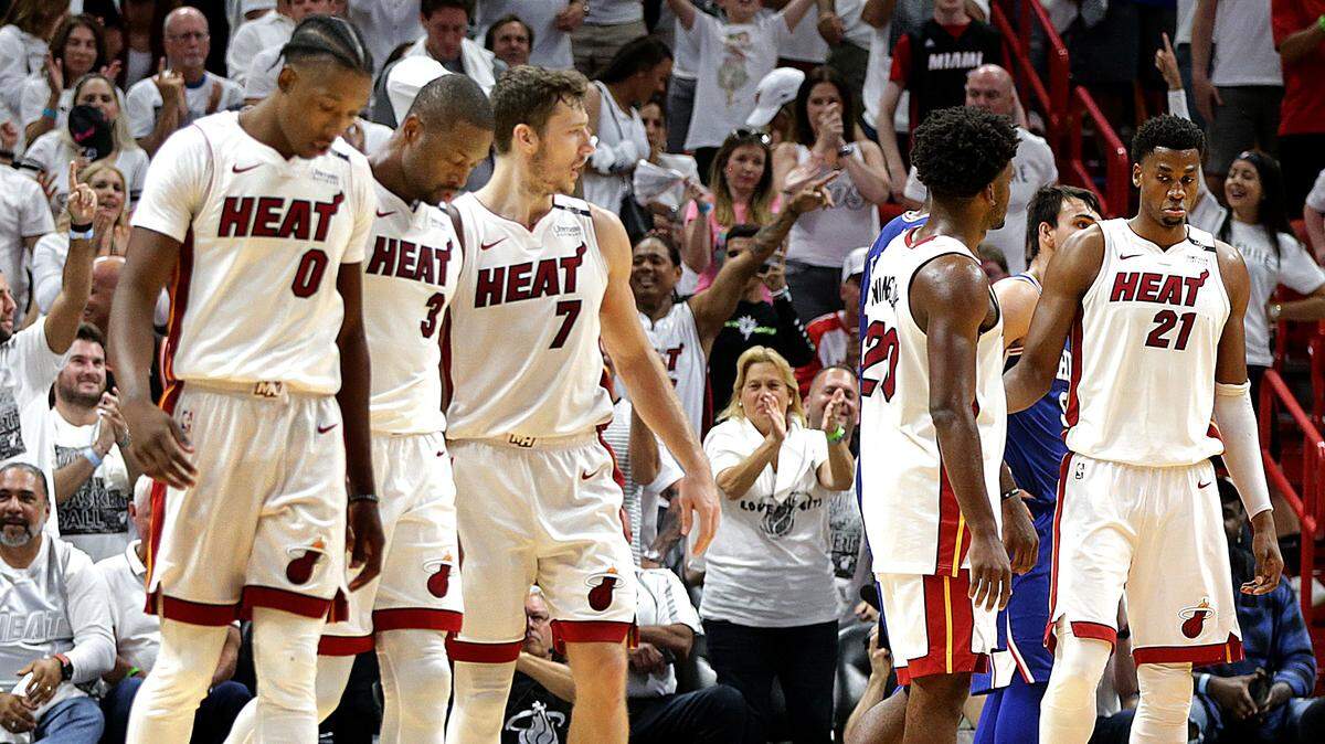 From left, Heat players Josh Richardson, Dwyane Wade, Goran Dragic, Justice Winslow and Hassan Whiteside react as Philadelphia leads in the fourth quarter of Game 4 of the first-round playoff series between the Miami Heat and the Philadelphia 76ers, at AmericanAirlines Arena in Miami on Saturday, April 21, 2018.