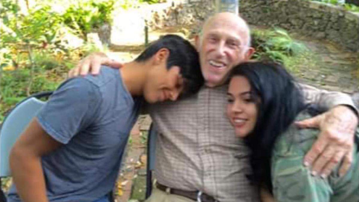 David Hertzig (center) died of his injuries Saturday after a hit and run driver plunged into him as he rode his bicycle to class Monday.