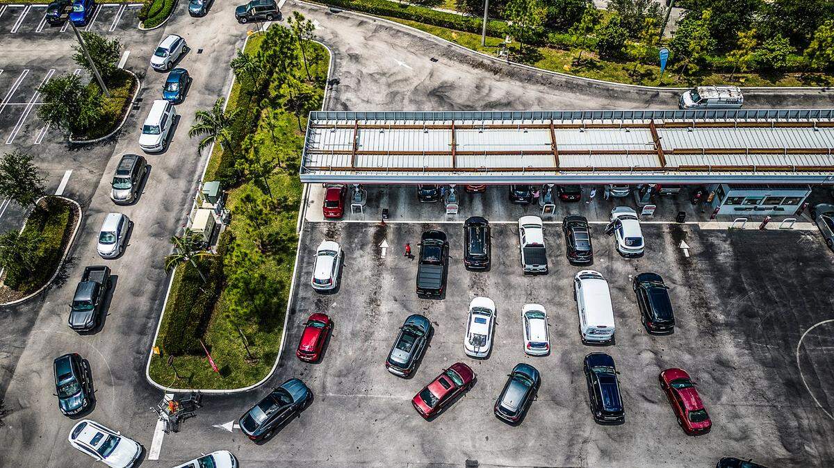 Long lines of cars are seen at the BJ’s Wholesale Club gas station located at 7050 Coral Way in Miami, FL, due to a shortage of fuel resulting from the floods on April 12 that disrupted operations at Port Everglades, the Broward County facility that is the hub for about 40% of the gasoline into Florida and serves 12 counties south of Lake Okeechobee, including Miami-Dade, Broward, the Keys and Palm Beach County.