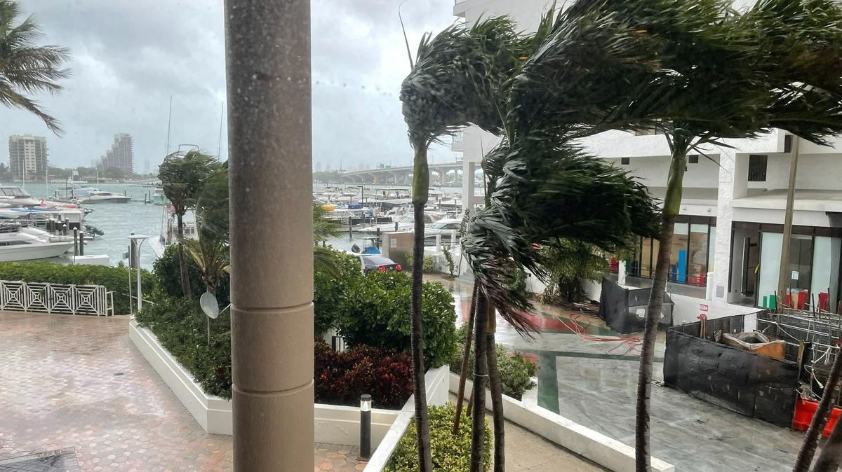 Heavy rains flooded the streets of downtown Miami during the Florida Floodplain Managers Association conference.