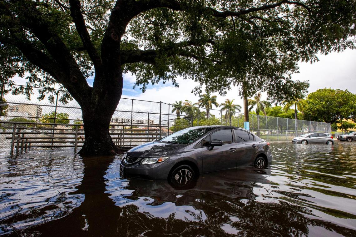 A car sits submerged under floodwaters at Riverside Park in the Little Havana neighborhood of Miami, Florida, on Saturday, June 4, 2022.