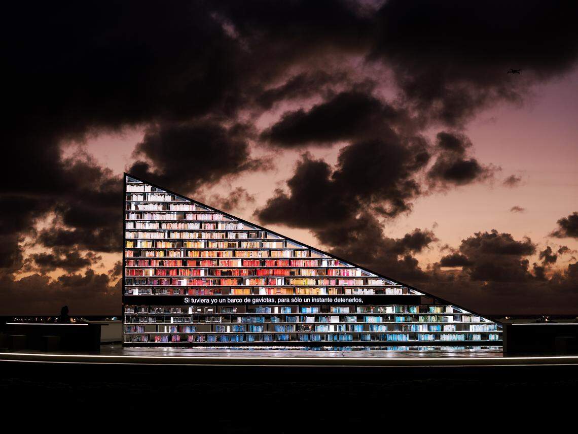 A night time view of Library of Us, a monumental artwork by Es Devlin and commissioned by Faena Art for Miami Art Week.