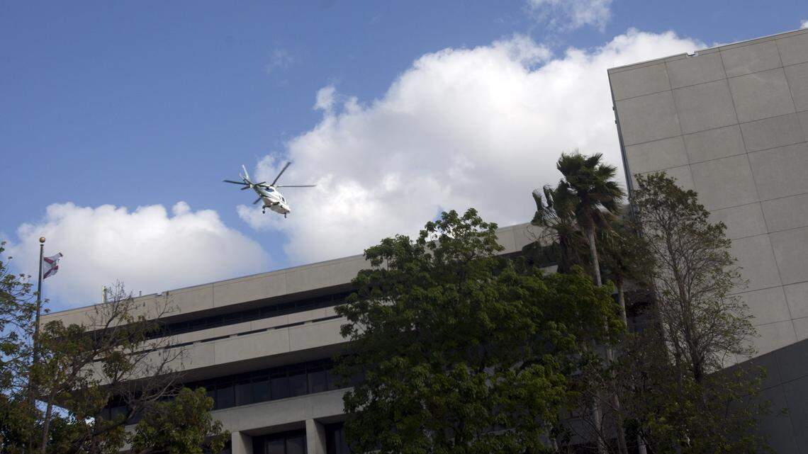 A helicopter lands on the roof of the FPL building at 9250 west Flagler street on Thursday March 3, 2011. FPL has been operating a helipad at its Miami headquarters for years without a mandatory county permit. In recent months, the county manager has allegedly been pressing to help the utility get a permit, even though it doesn’t meet the requirements.