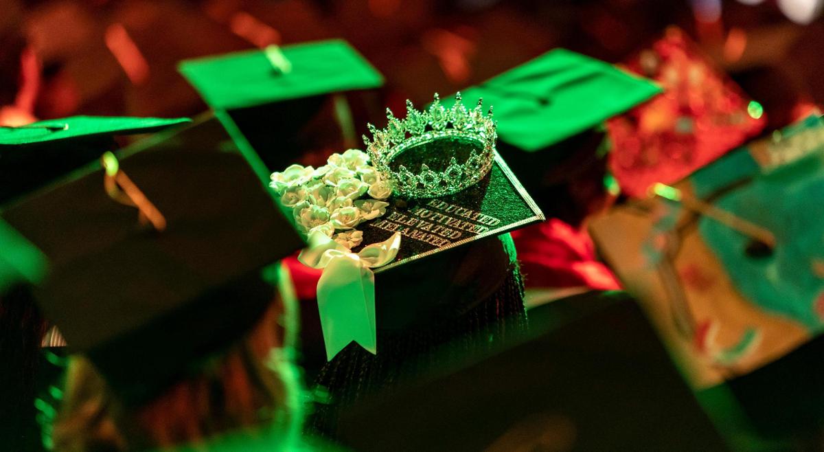 Auryana Pettigrew, 20, decorated her cap with a dazzling crown to collect her diploma in psychology. The Florida native said after she felt “excited but nervous.” “It’s like I’m starting a new life,” she said, giggling. “I’m an adult now. I’m not playing anymore.”