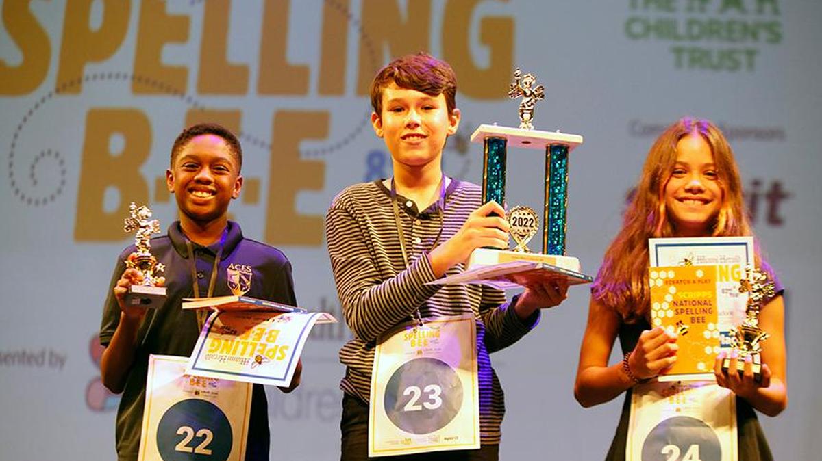The three winners of the Miami Herald Spelling Bee for Miami-Dade and Monroe students: from left, Aventura City of Excellence School sixth-grader James Reese, 11, who came in third; winner Juan Cristóbal Rondeau, 13, a seventh-grader at Westminster Christian; and Isabella Velasquez, 11, a fifth-grader at South Pointe Elementary, who placed second. The Bee was held Thursday, March 17, 2022, at Charles F. Dodge City Center in Pembroke Pines.