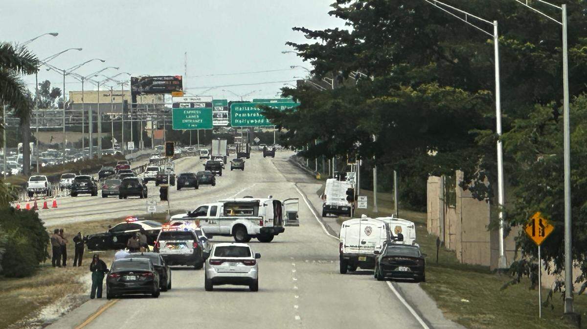 The scene on the entrance ramp to I-95 at Ives Dairy Road/Northeast 203 Street, where police are investigating the dead body of a woman that was found early Saturday morning.
