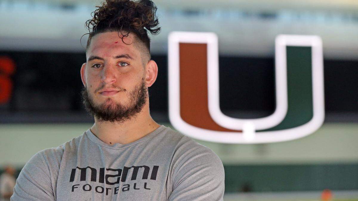 Defensive lineman Jacob Lichtensteinwith (55) waits to meet with reporters after practice at the University of Miamis Greentree Practice Field in Coral Gables, Florida on Tuesday, April 12, 2022.