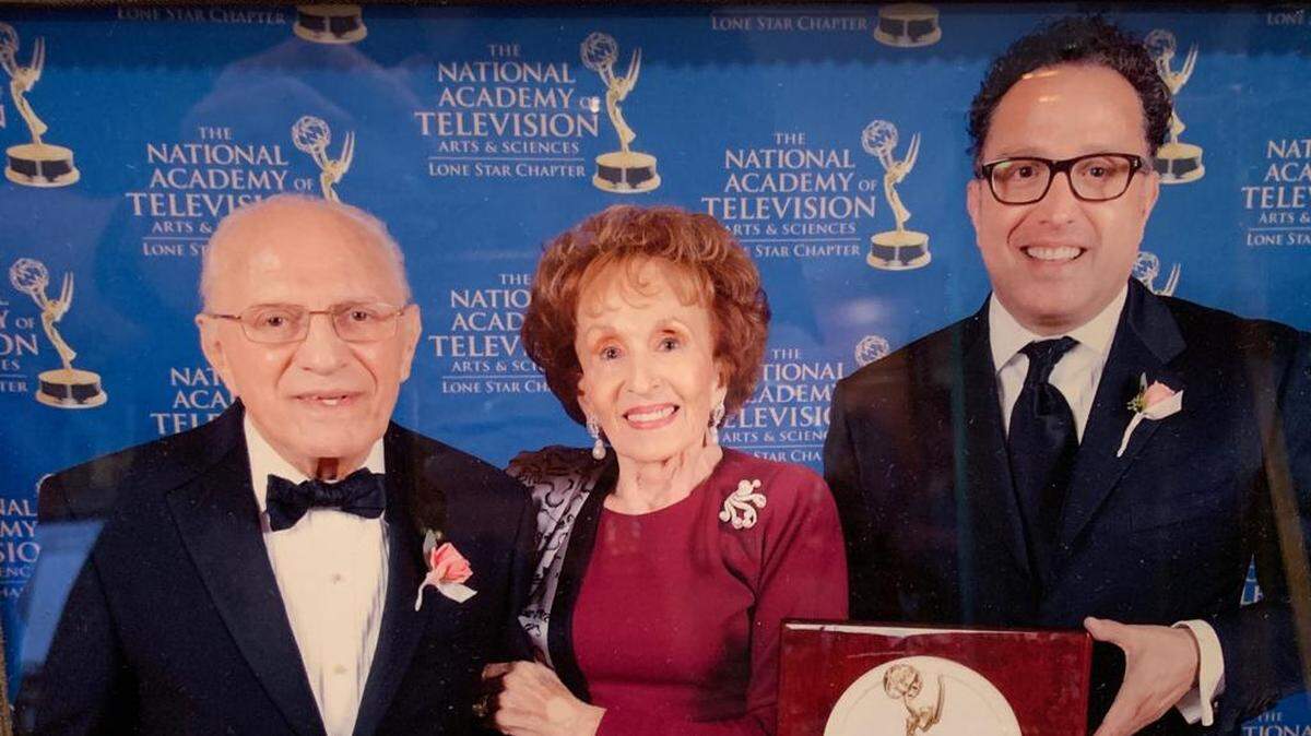 Emilio Nicolás (left) poses for a photo with his wife, Irma Alicia Cortéz Nicolás (center) and their son, Guillermo during an award ceremony.