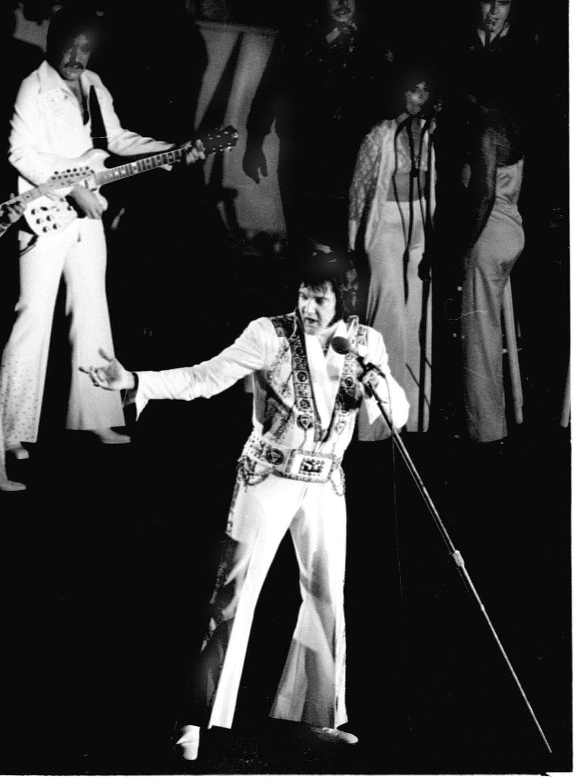At the Sportatorium, Elvis Presley and his musicians play to his South Florida fans in the 1970s.