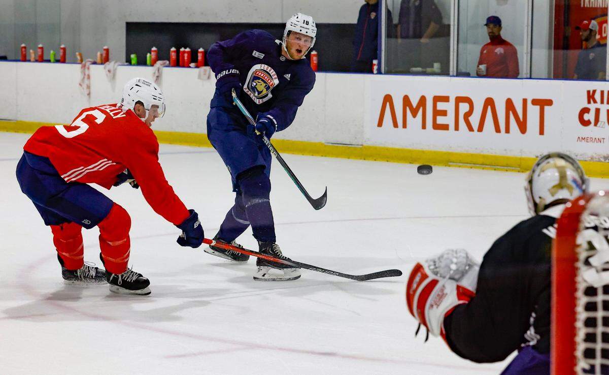 Florida Panthers forward Steven Lorentz (18) attempts a goal during practice drills at Florida Panthers IceDen in Coral Springs, Florida on Thursday, September 21, 2023.