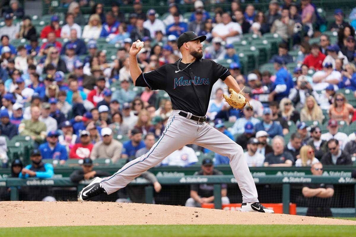 Miami Marlins starting pitcher Matt Barnes (32) throws the ball against the Chicago Cubs during the first inning at Wrigley Field on Saturday, May 6, 2023.