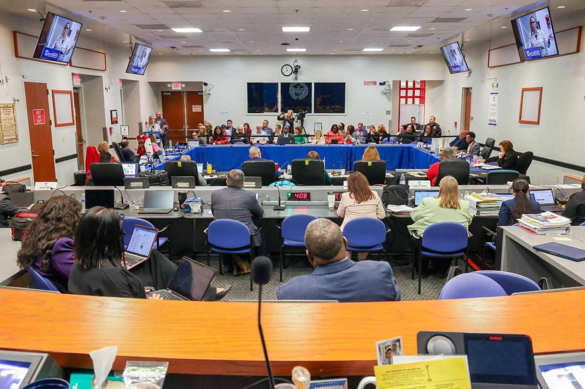 The community gathers for a workshop inside the Kathleen C. Wright Building in Fort Lauderdale, Florida that will address potential school closures.