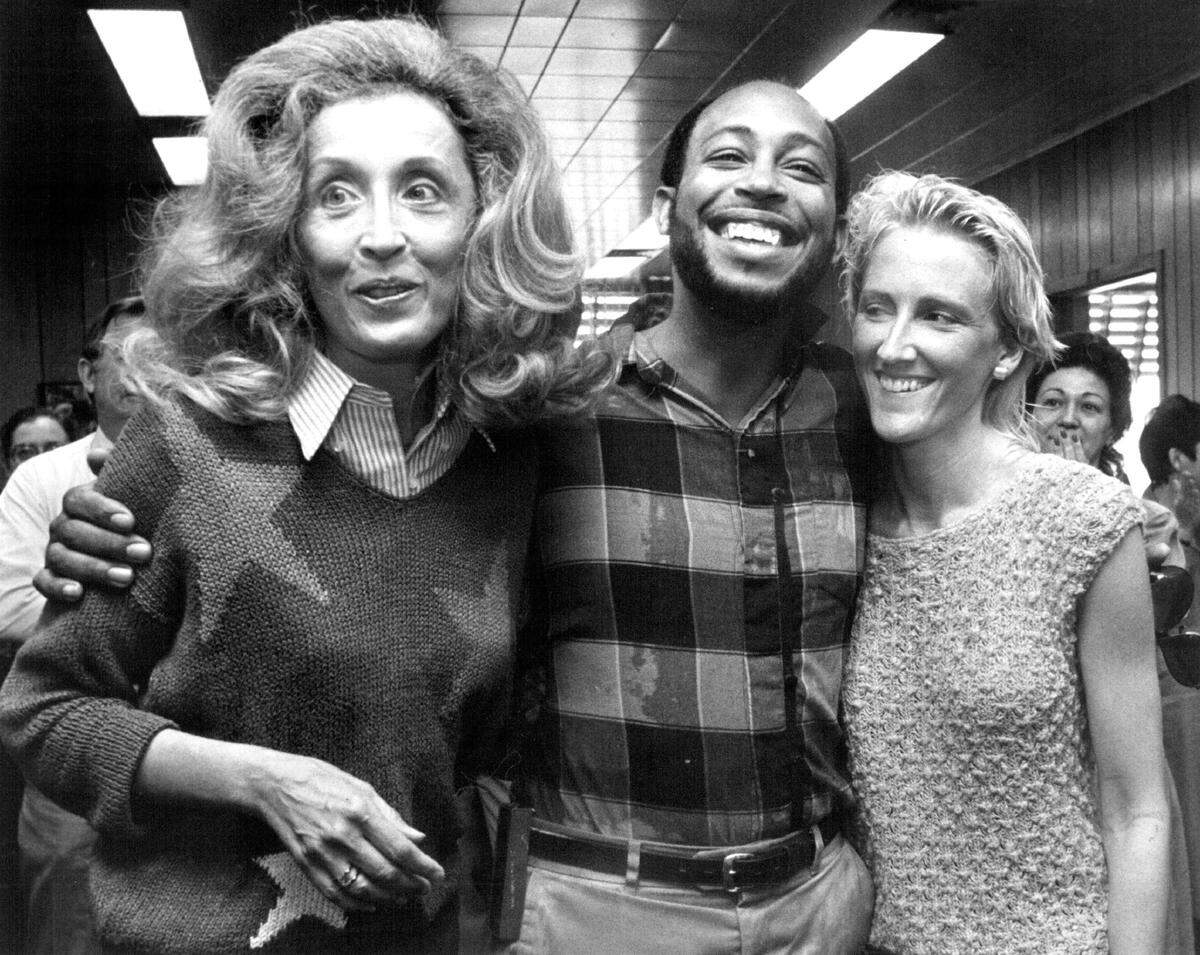 Edna Buchanan, left, with photojournalist colleagues Michel du Cille and Carol Guzy in 1986.