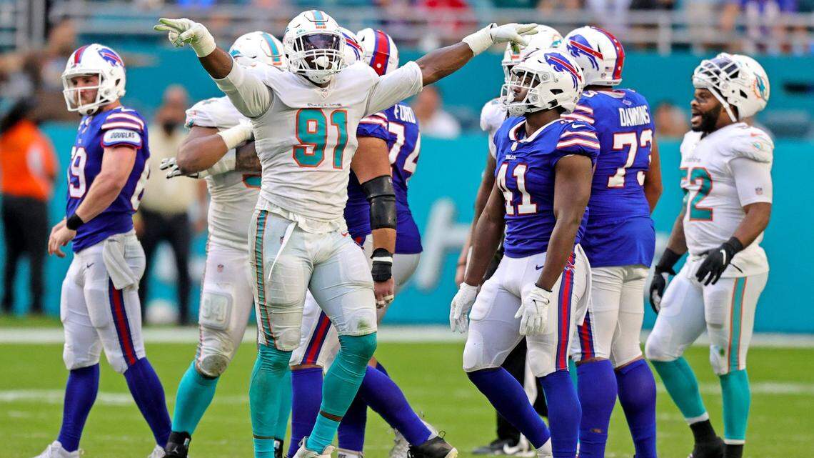 Miami Dolphins defensive end Emmanuel Ogbah (91) reacts after Buffalo Bills kicker Tyler Bass (2) missed a field goal during second quarter of an NFL football game at Hard Rock Stadium on Sunday, September 19, 2021 in Miami Gardens, Florida.