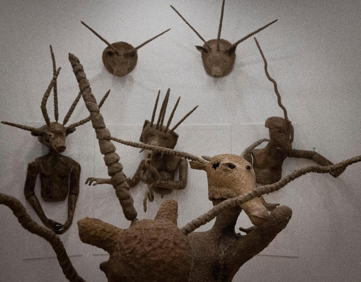 An entire collection from the Ségou called The Ségou Collection (I’ve Known Rivers), an African art exhibit, sits on display during the “Art of Transformation” preview on Monday, Dec. 4, 2023, in the Hurt Building in Opa-Locka. These figures based on African folklore stories made by putting plaster over wire.