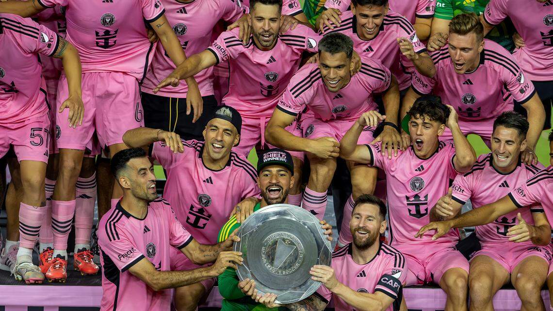 Inter Miami forward Lionel Messi (10) celebrates with his teammates Sergio Busquets (5) Luis Suárez (9) and Drake Callender (1) after winning the MLS Supporters’ Shield after their match against the New England Revolution at Chase Stadium on Saturday, October 19, 2024 in Fort Lauderdale, Florida.