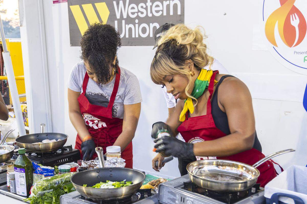 Chefs prepare food at the 2023 Grace Jamaican Jerk Festival.