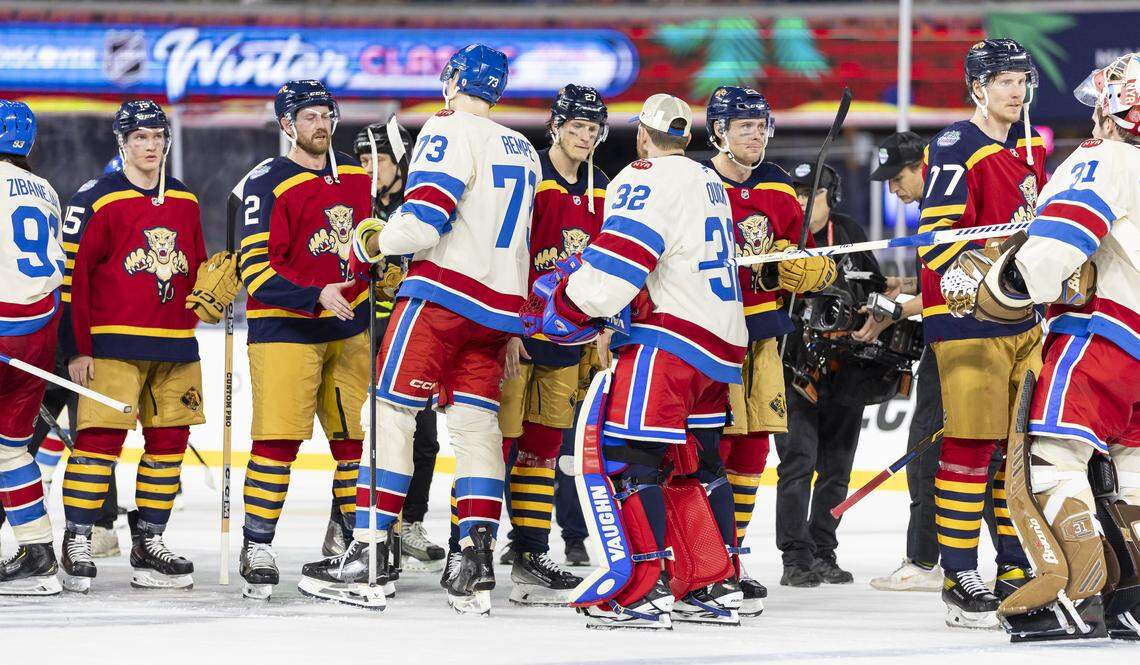 The Florida Panthers and the New York Rangers shake hands after their Winter Classic outdoor hockey game at loanDepot park on Friday, Jan. 2, 2026, in Miami, Fla. The Rangers defeated the Panthers.