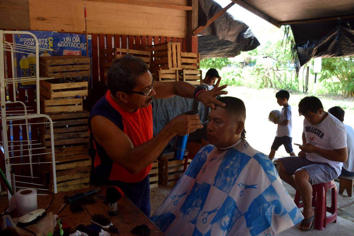Jose Martinez, a Venezuelan barber, is rebuilding his life in the Peruvian town of Iñapari. Although many others fleeing Venezuela head to big cities, Martinez said business is booming in the small town because he’s one of the few barbers in hundreds of miles.