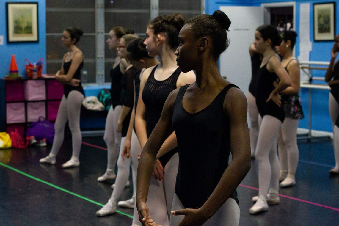 ‘Armour Dance Theatre teaches dancers to express the movement of their own body rather than someone else’s body,’ says Stephanie Bell, forefront, an ADT student and high school junior at the New World School of the Arts.