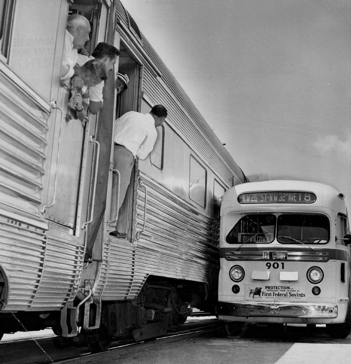 A bus got too close to a train at Northwest North RIver Drive and 24th Street in Miami in 1950.