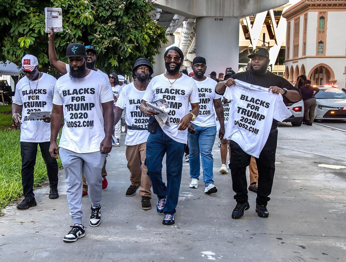 Members of the Blacks for Trump supporters group lead by Maurice Symonette (center) marched in front of the Miami Federal Courthouse ahead of former President Donald Trump’s court appearance, on Tuesday, June 13, 2023.