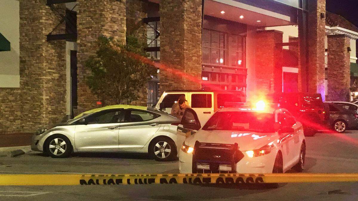 A dead man was found in a car and Town & County Center in Kendall Friday night.