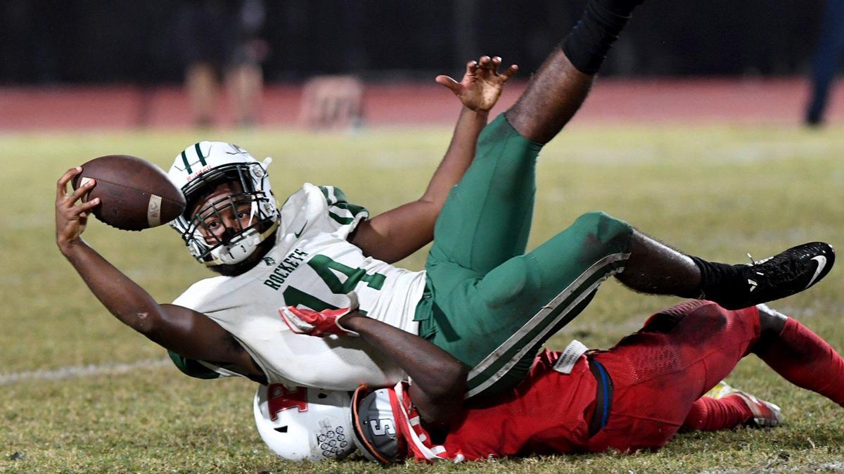 Miami Central’s Yulkeith Brown catches a pass in Friday night’s Class 6A state semifinal at Palmetto High’s Harllee Stadium.