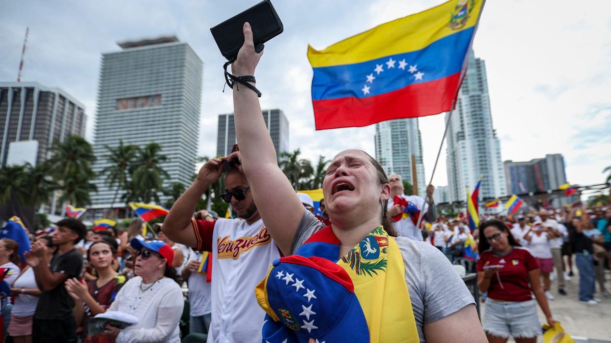 Miami, Florida, August 17, 2024 -Blanca Solorzano weeps after having recited Venezuela’s national anthem at a rally at Bayfront Park in downtown Miami, Fla. The rally was held in opposition of Venezuelan strongman Nicolás Maduro and what many in the international community believe was a rigged election.