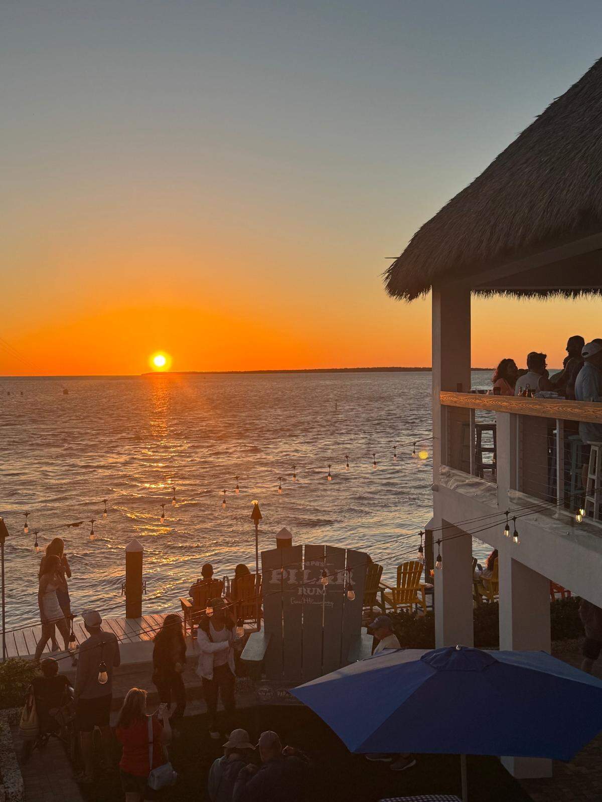 Sunset at Papa Joe’s Waterfront is all about good food, cold drinks and front-row seats to the sky’s best show.