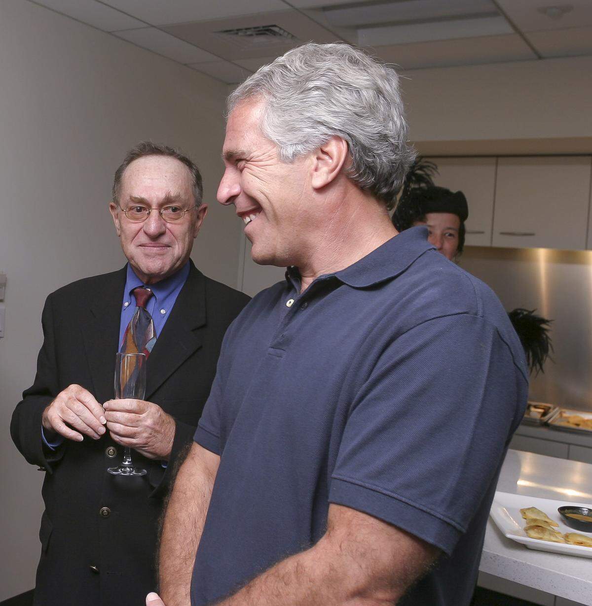 On Sept. 9, 2004, Jeffrey Epstein (second from left) hosted a dinner at Harvard University. With Epstein at dinner were (left to right) Alan Dershowitz, Robert Trivers, and Lawrence Summers, now the former university president.