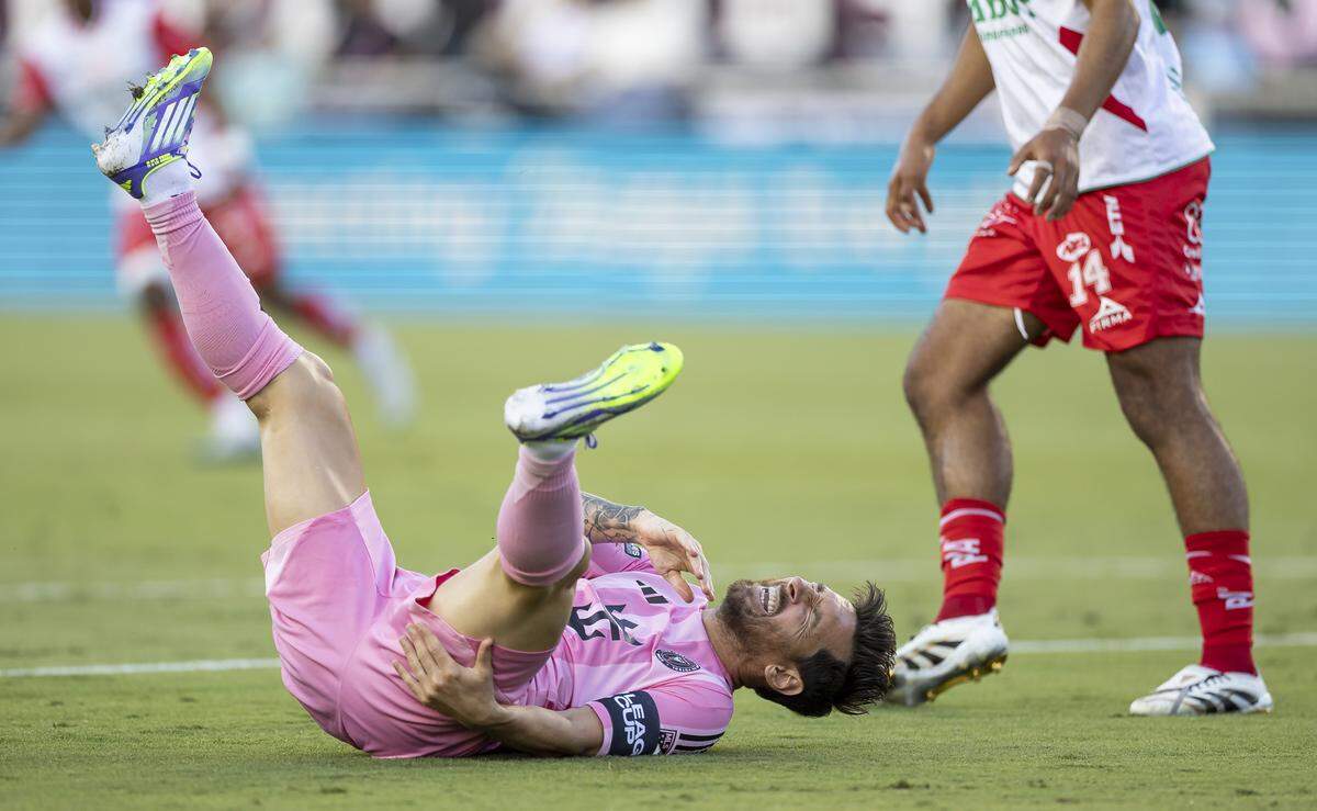 Inter Miami CF forward Lionel Messi (10) falls to the ground after a play against Necaxa in the first half of their Leagues Cup Phase One soccer match at Chase Stadium on Saturday, Aug. 2, 2025, in Fort Lauderdale, Fla.