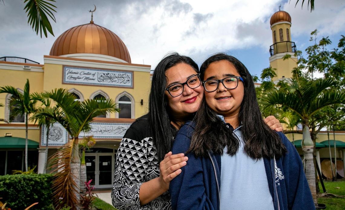 Olivia Cantu, with daughter Mya Massoud, 11, in front of the Islamic Center of Greater Miami in Miami Gardens on Friday.