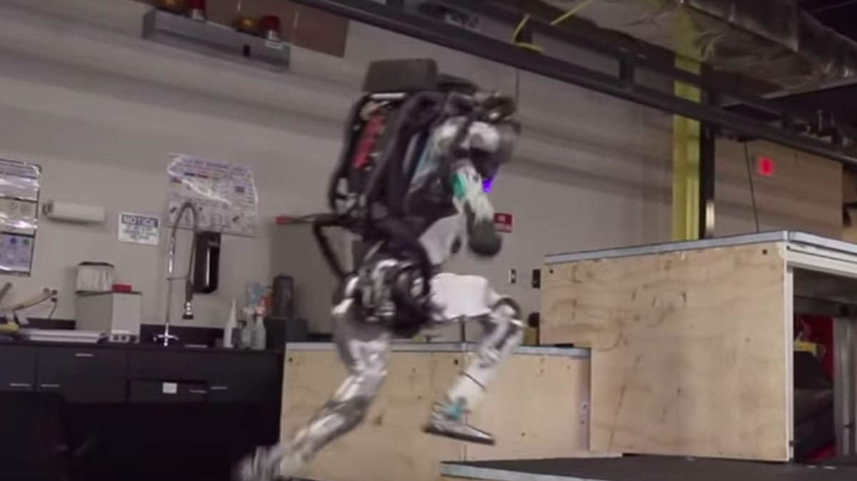 Atlas leaping diagonally between platforms.