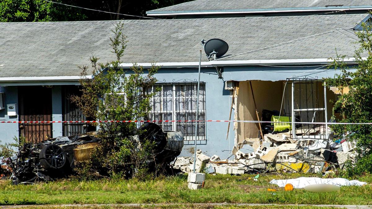 The scene where three people were killed and two others were injured after a car crashed into the bedroom of a home near Northeast 82nd Street and Third Avenue in Miami, Florida, on Wednesday, May 25, 2022.