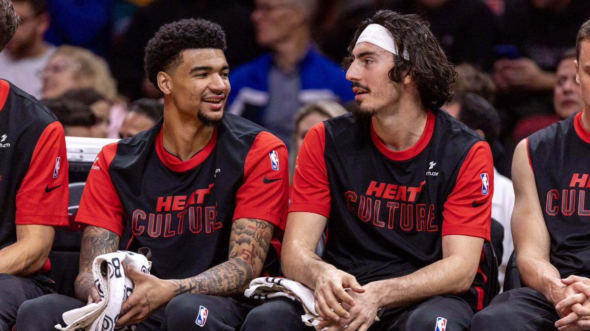 Miami Heat center Kel'el Ware (7) reacts alongside Jaime Jaquez Jr. (11) during the first half of an NBA game against the Utah Jazz at Kaseya Center on January 4, 2025, in Miami.