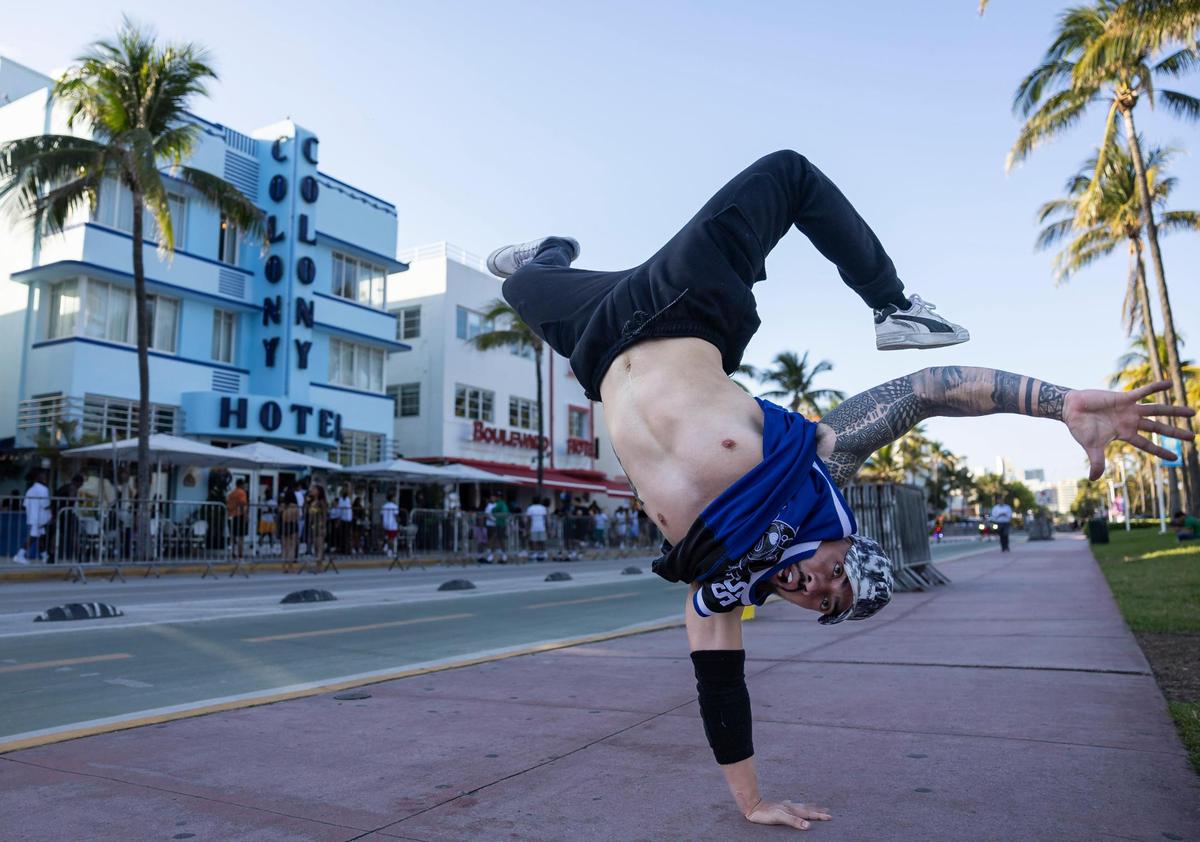 Juan Gama, from Coral Gables, break dances on Ocean Drive during spring break on Friday, March 15, 2024, in Miami Beach.&nbsp;