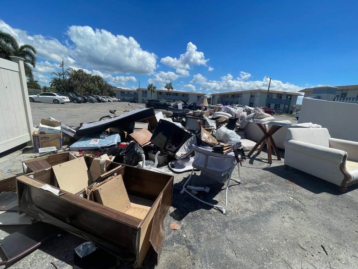 Water-damaged furniture waits to be picked up at the Stillwater Cove apartments in Naples’ River Park neighborhood on Saturday, Oct. 1, 2022. The area was damaged due to floodwaters from Hurricane Ian.