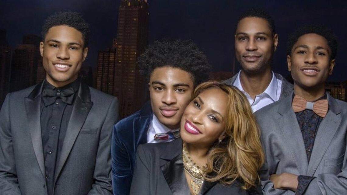 University of Miami basketball player Willie Herenton (hugging mother, Andrea, in middle) with brother Rodney Jr. (left), father Rodney (second from right), brother Samuel (right).