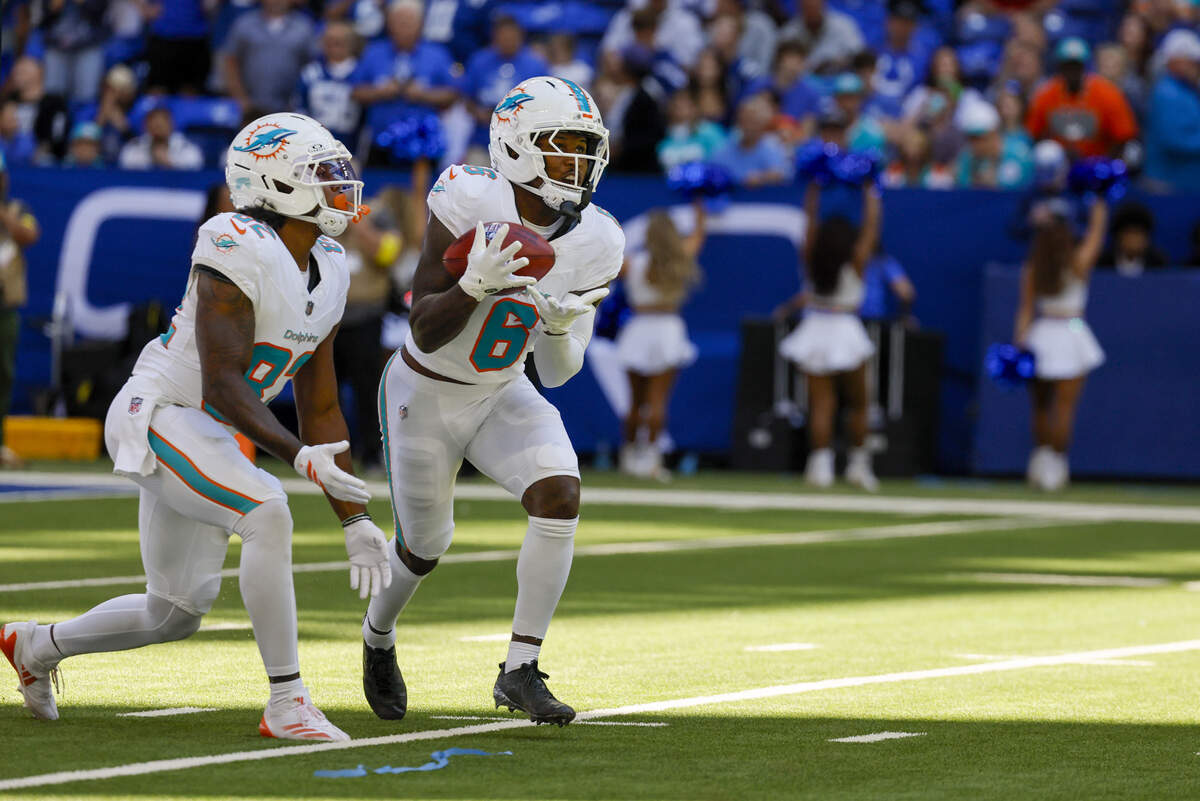 Miami Dolphins wide receiver Malik Washington (6) fields a punt during the first half of an NFL game against the Indianapolis Colts at Lucas Oil Stadium on Sunday, September 7, 2025, Indianapolis, Indiana.
