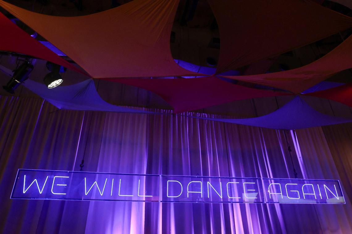 The message “We Will Dance Again” is seen written on LED lights at the Nova Exhibition Miami at Greenwich Studios in North Miami. The exhibit honors the victims and survivors of the Hamas attacks at The Nova Music Festival on October 7th of last year.